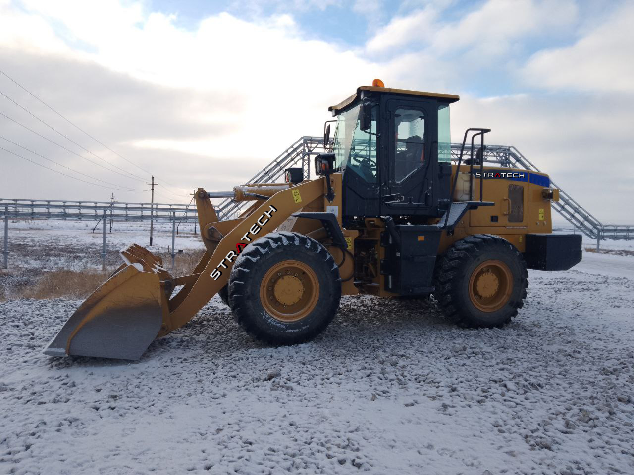 Что такое фронтальный погрузчик в Тюмени